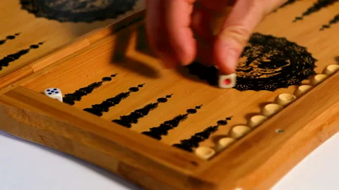 The player takes three five dice from the backgammon board. Stock Footage 165554288