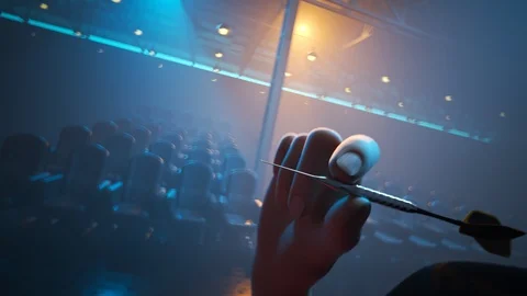 Player throwing a dart hitting perfectly in the bullseye of the dartboard. Stock Footage 104432132