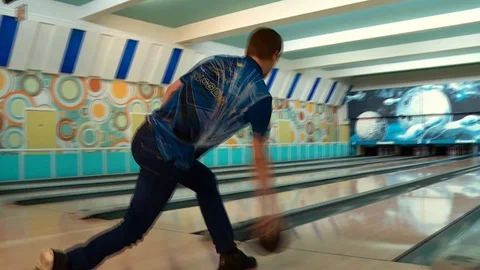 The player throws the ball in bowling. Strike! Stock Footage 91168840