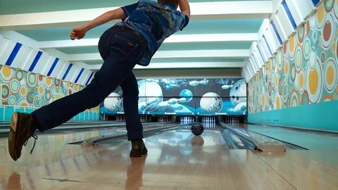 The player throws the ball in bowling. Strike! Spare! Stock Footage 91168960