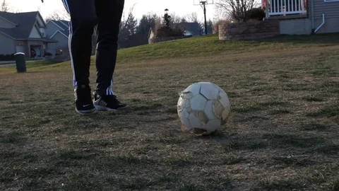 Player Walks Toward Rolling Ball Stock Footage 83765495