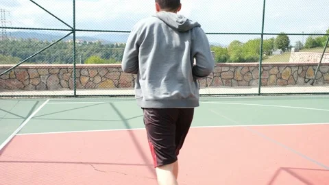 Player warming up, basketball player warming up on the basketball court Stock Footage 164072093