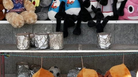 The player will hit the cans and win. Stock Footage 88653971