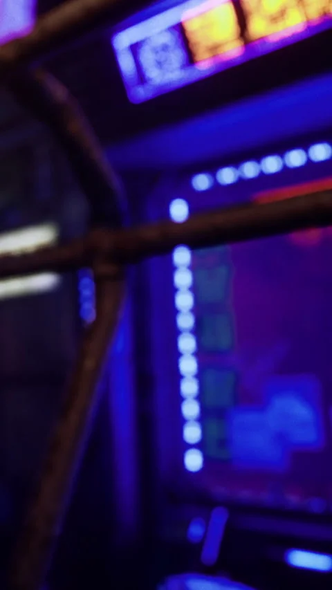 Players enjoy time at arcade with neon lights and vintage machines Stock Footage 331750870