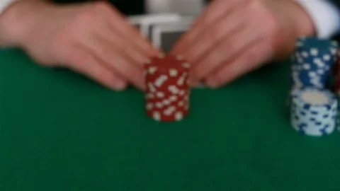 The player's hand moves the playing chips forward Stock Footage 102646195