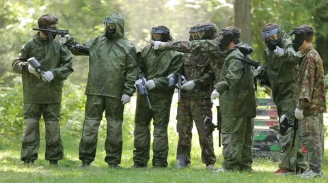 Players in a paintball stipulate the strategy before the game. Stock Footage