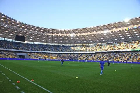 Players run during training session at nsc olimpiyskiy stadium Stock Photos
