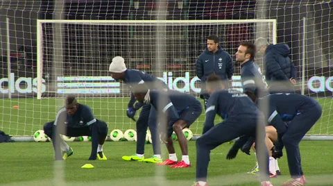The players at the stadium warm up before the game Stock Footage 33791099