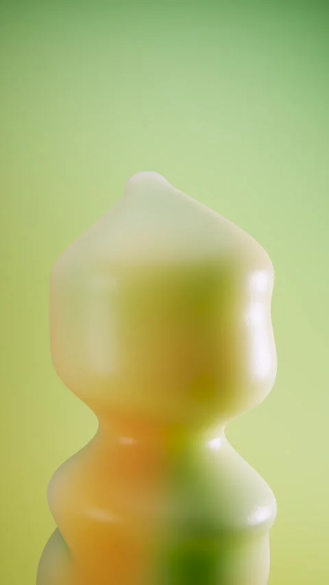 Playful abstract shape loop with glossy texture and fluid change. Stock Footage 347809132