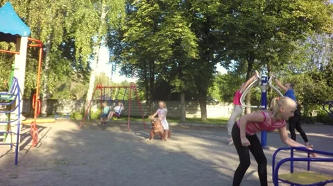 Playful children having fun on the ground Stock-Footage 64808073