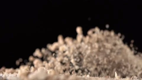 Playful Food Video of Crumbs Bouncing Up and Down Stock Footage 201284249