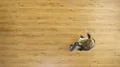 The playful girl whirl on the floor 4k or 4k+ Resolution