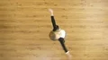 The playful girl whirl on the floor 4k or 4k+ Resolution