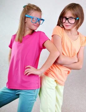 Playful girlfriends with eyeglasses Stock Photos