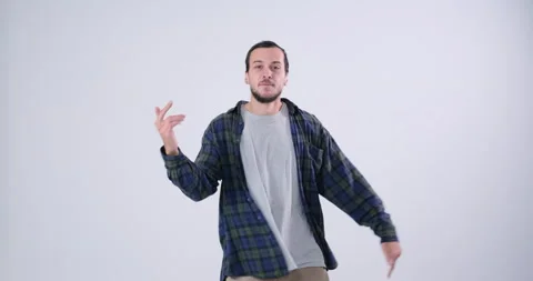 Playful Man dancing over white background Stock Footage 143945103