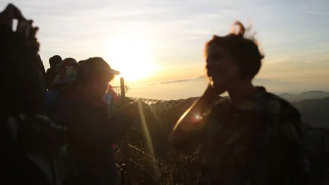 Playful Shot of Tourist posing at Mount Bromo, Java, Indonesia Stock Footage 131153033
