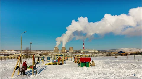 Playground and combined heat and power plant Stock Footage 59190943