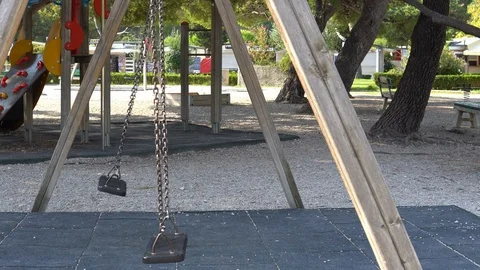 A Playground and swing on the chains Stock Footage 98046260