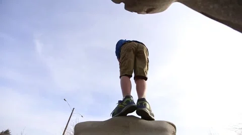 Playground boy jumping Stock Footage 50123281
