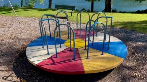 Playground Carousel Spinning At Park Elevated View Stock Footage 346304744