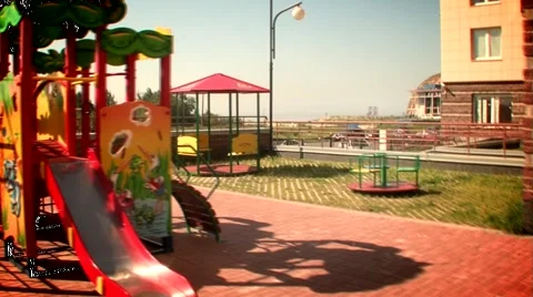 Playground child on a swing Stock Footage 5086981