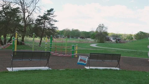 Playground closed due to Covid-19 sign Stock Footage 129458724