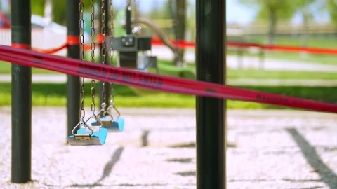 Playground closed off with red caution tape Video stock 129469759