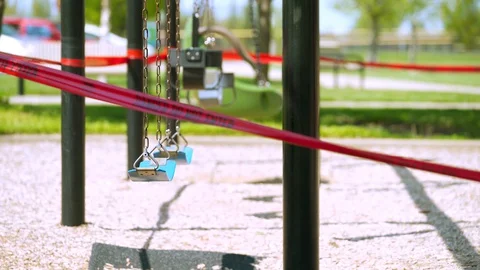 Playground closed off with red caution tape Vídeos de archivo 129470269
