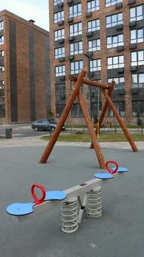 Playground in the courtyard of an apartment complex Stock Photos