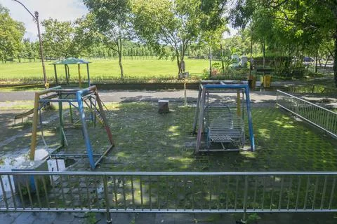 Playground that is empty because it is closed in order to comply with health  Stock Photos