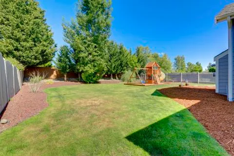 Playground for kids on backyard Stock Photos