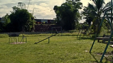 Playground pan left to right one swing swinging Видео 49949473