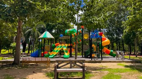A playground with slides and educational elements in the park Stock Photos