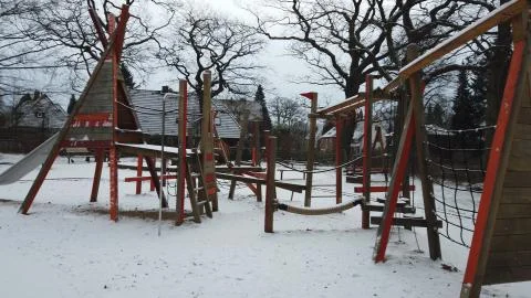 Playground structure covered with snow 库存照片
