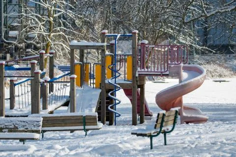 A playground structure covered in snow . Stock Photos