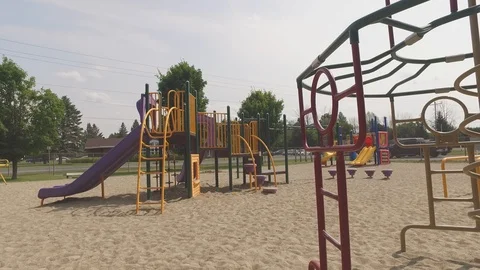 Playground structures in sand slider angle Stock Footage 103644590