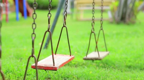 Playground swing in a park Stock Footage 40551002