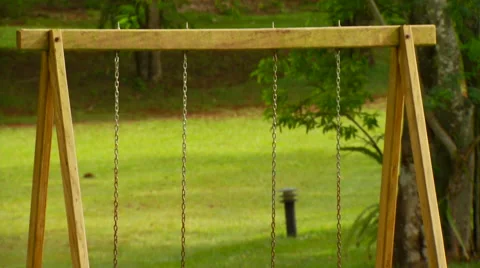 Playground swing in park Stock Footage 57814392