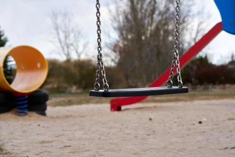 Playground swing set selective focus 스톡 사진