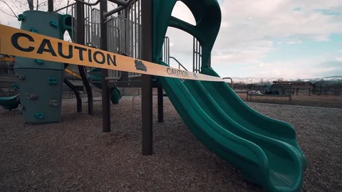 Playground Taped Off with Caution Sign Stock-Footage 128358345