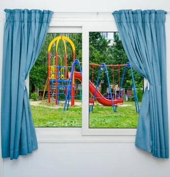 Playground view out the window Stock Photos