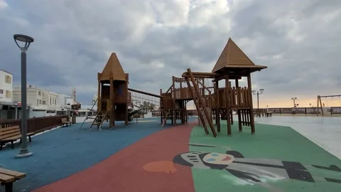 Playground, wooden, structures, red, green, blue, protective, flooring Video stock 169600525