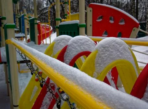 Playground in the yard in winter Stock Photos