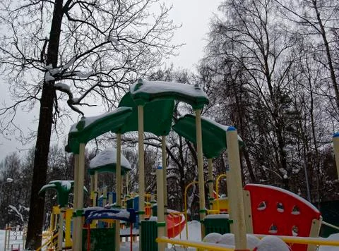 Playground in the yard in winter Stock Photos