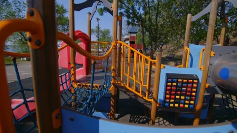 Playgrounds on the lake river bank empty due to the pandemic, covid-19 库存影片 129523990