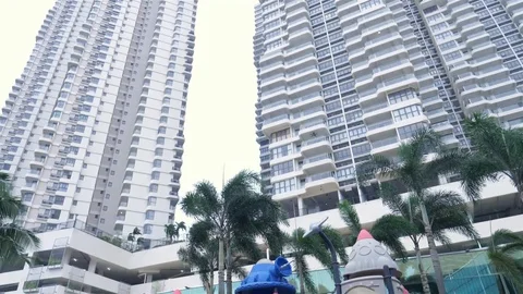 Playgroup Under the Apartment - Tilt Down Stock Footage 122209148