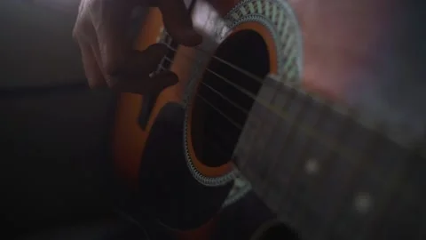 Playig guitar Stock Footage 234730285
