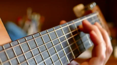 Playing On An Acoustic Guitar Stock Footage 56299700