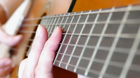 Playing On An Acoustic Guitar Stock Footage 56299744