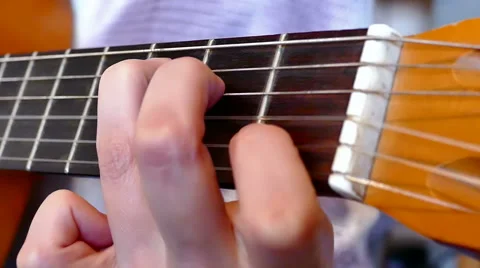 Playing On An Acoustic Guitar Stock Footage 56299965